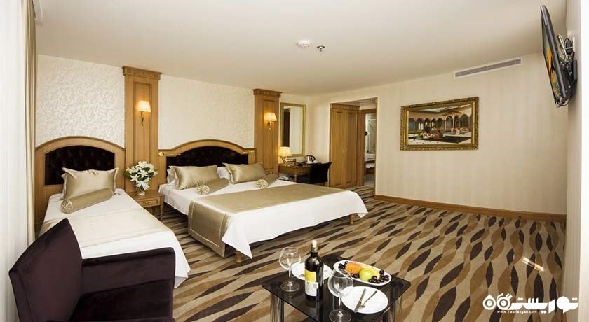 نمای تخت های اتاق تریپل