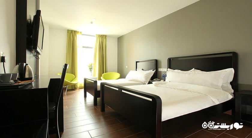 نمای تخت های اتاق دلوکس تریپل