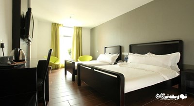 نمای تخت های اتاق دلوکس تریپل