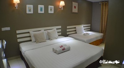 نمای تخت های اتاق دلوکس تریپل