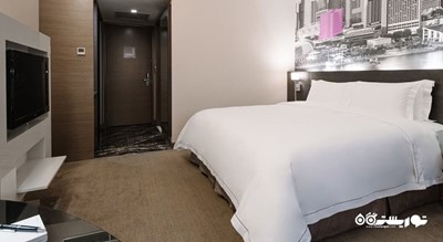 تخت بزرگ اتاق دلوکس کلاب