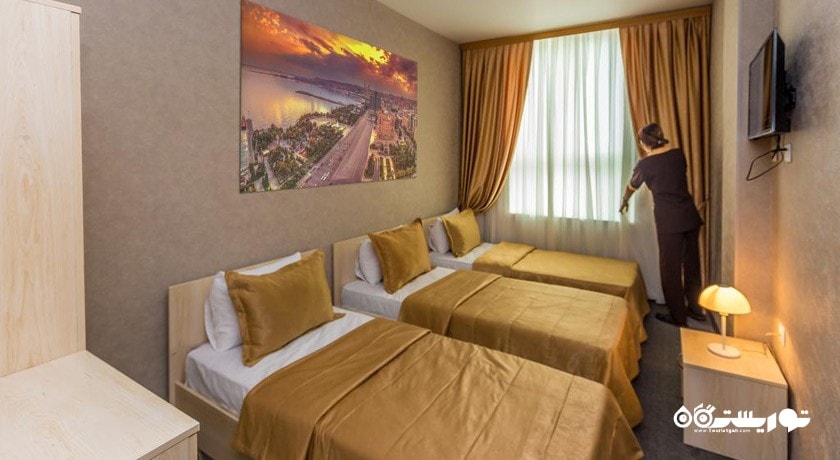 نمای تخت های اتاق تریپل