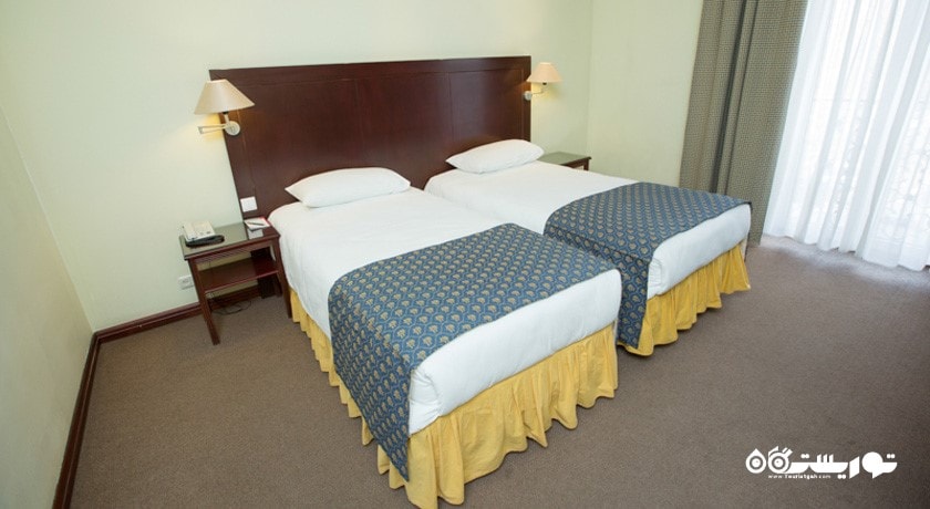 نمای تخت های اتاق توئین