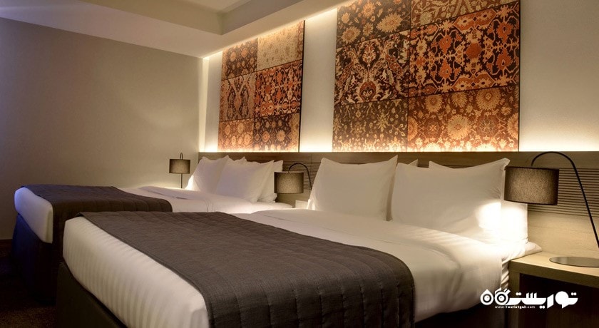 نمای تخت های اتاق کوادریپل