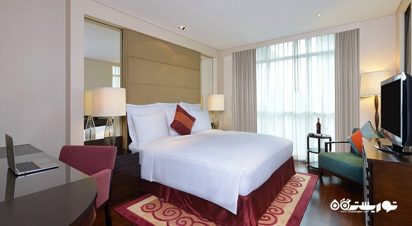 نمای تخت بزرگ سوئیت اگزکیوتیو سه خوابه