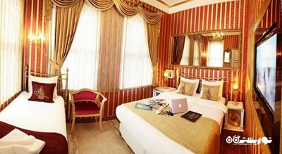 اتاق دلوکس تریپل هتل سلطان طوگرا