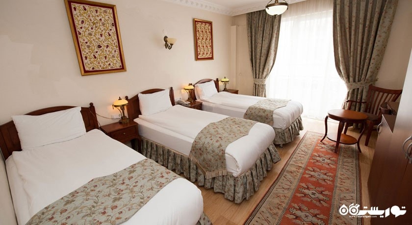 نمای تخت های اتاق تریپل