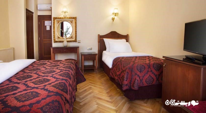 نمای تخت های اتاق تریپل