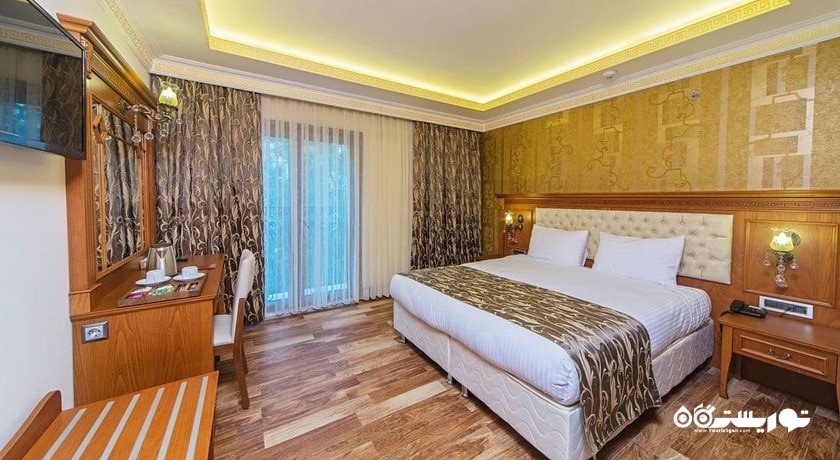 نمای تخت بزرگ اتاق فمیلی