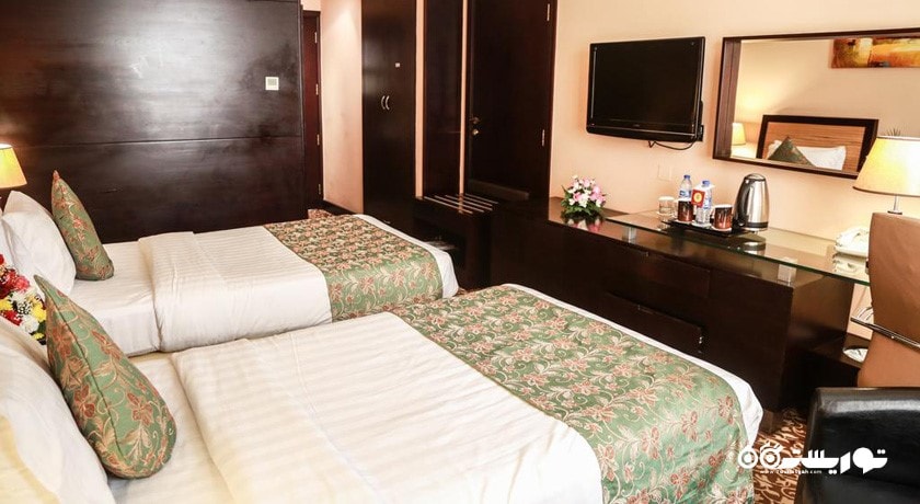 نمای تخت های اتاق توئین