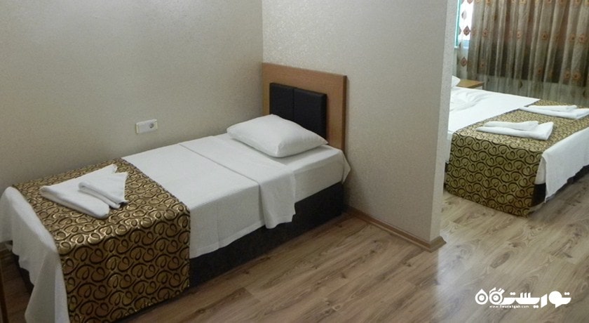 نمای تخت های اتاق تریپل