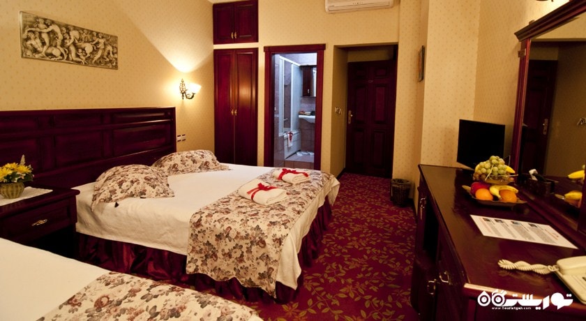 نمای تخت های اتاق تریپل