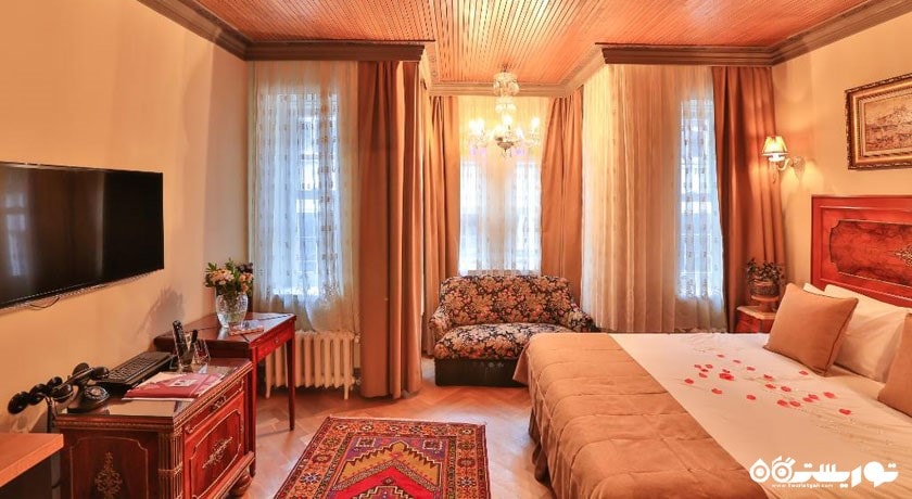 نمای تخت بزرگ آپارتمان دو خوابه هتل	