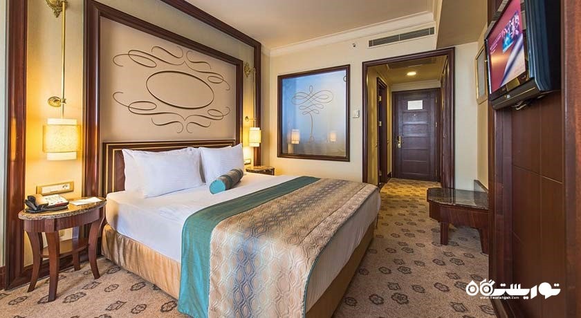 اتاق دلوکس هتل الیت ورلد	