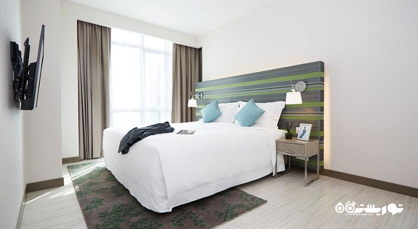 تخت بزرگ آپارتمان دلوکس سه خوابه
