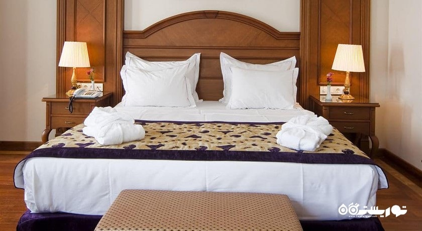 اتاق دلوکس هتل جی ال کی پرمییر هوم سوئیتز