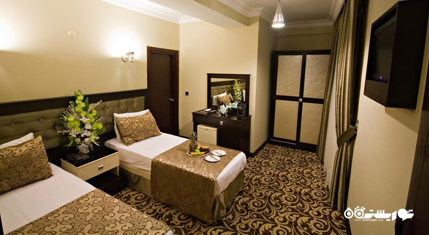 نمای تخت های اتاق تریپل