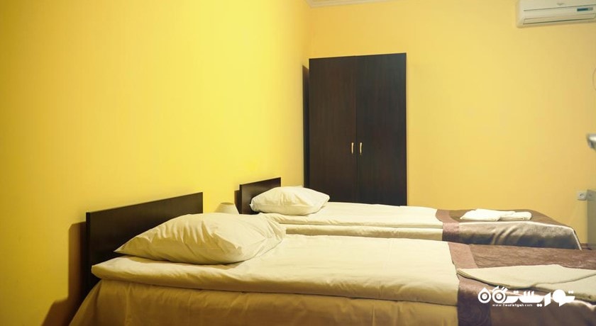 نمای تخت های اتاق توئین