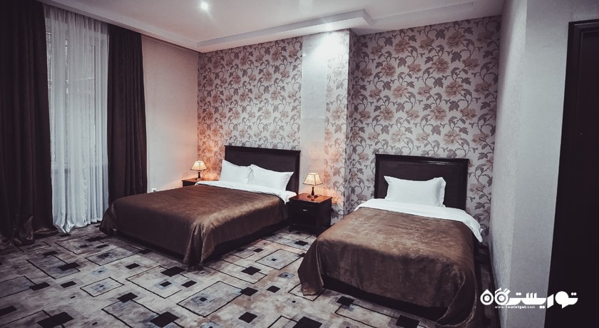 نمای تخت های اتاق تریپل