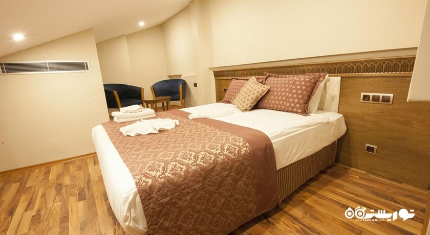 تخت بزرگ اتاق دلوکس فمیلی