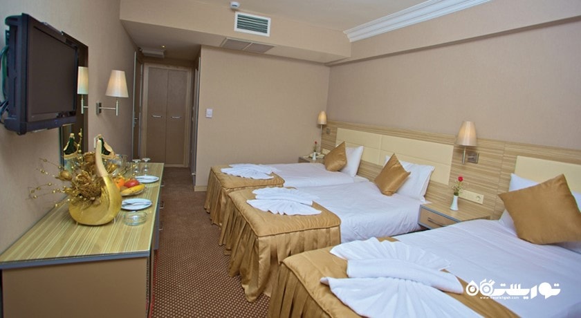 نمای تخت های اتاق تریپل