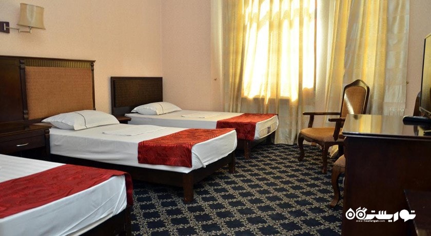 نمای تخت های اتاق تریپل