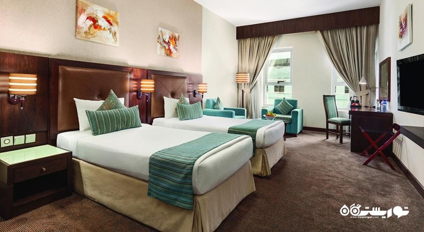 نمای تخت های اتاق توئین