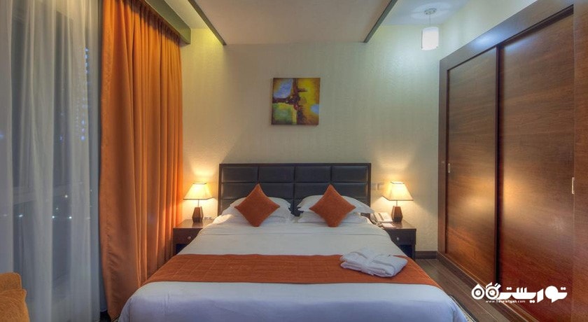 نمای تخت بزرگ آپارتمان دوخوابه