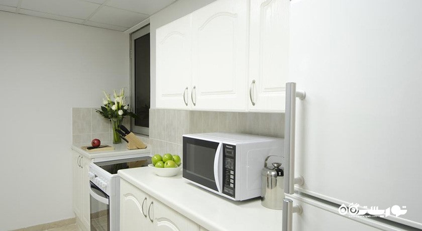 نمای آشپزخانه آپارتمان دلوکس یک خوابه