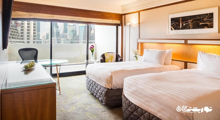 تخت های توئین اتاق با بالکن