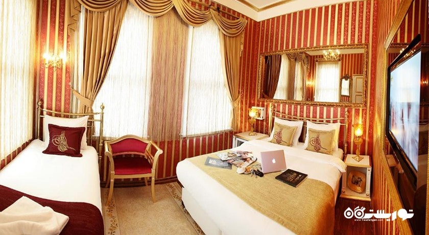 اتاق دلوکس تریپل هتل سلطان طوگرا