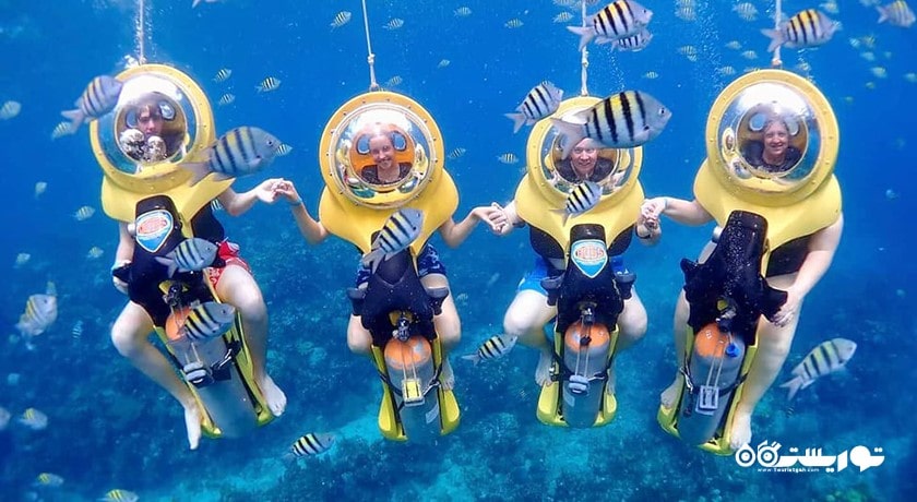 سرگرمی اسکوتر سواری دونفره زیر آب در بالی شهر اندونزی کشور بالی